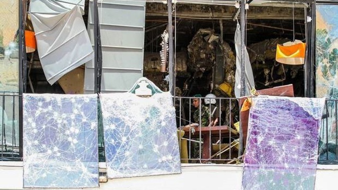 Security forces inspect the scene after a blast targeting The Kingsbury hotel in Colombo. It was one of three hotels targetted in the co-ordinated attacks. Photo / AP
