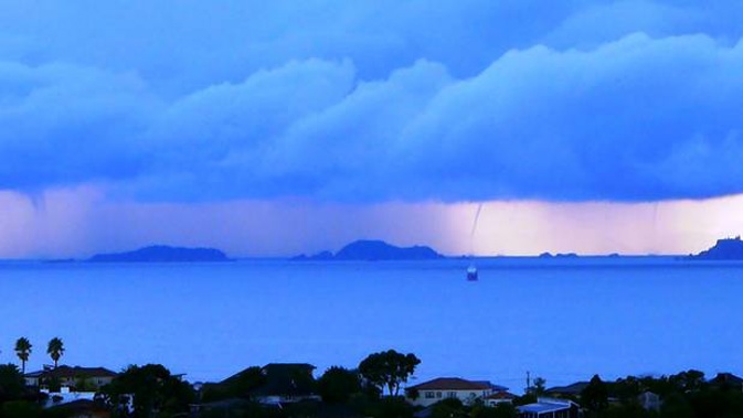 Multiple waterspouts over the Hauraki Gulf this morning. Photo / Claire Jefferson