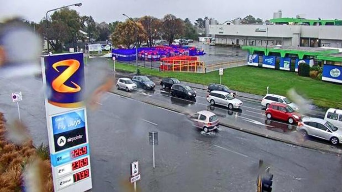Heavy rain is causing surface flooding on more than a dozen roads in Christchurch, including Curletts Rd. Photo / CTOC