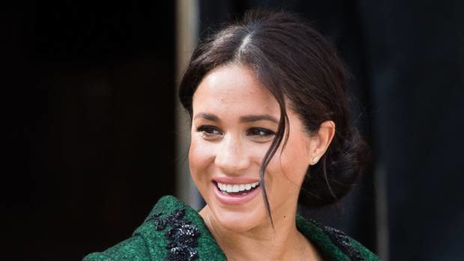 Despite her baby being overdue, sources insist Meghan Markle is "relaxed and positive". (Photo / Getty)