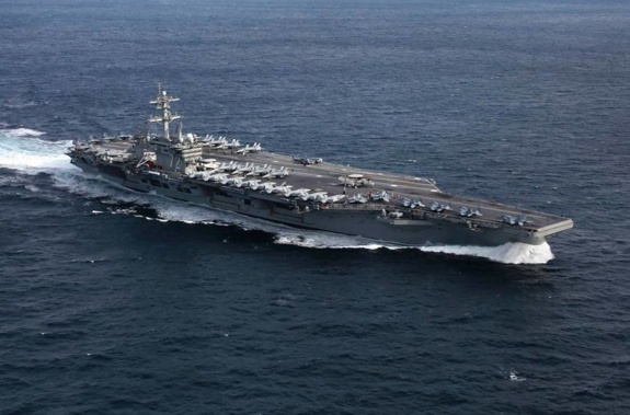 An aircraft carrier is one of many means the US are using to "send a message to Iran". (Photo / Supplied)