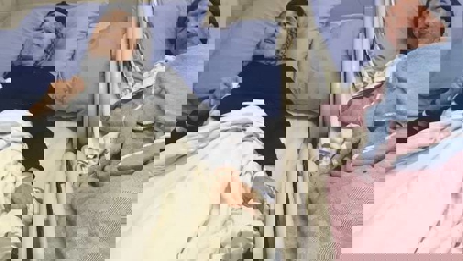 Ali Majid in hospital in Canada with his wife Mahieh Amin before he died over the weekend. (Photo / Supplied)