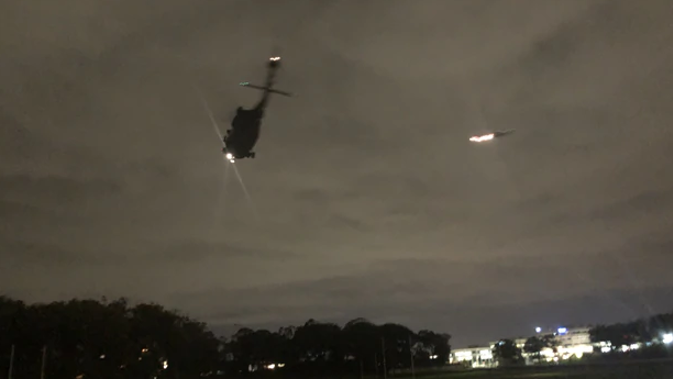 The two helicopters landed on Auckland Domain for a short time before leaving. (Photo / Supplied)