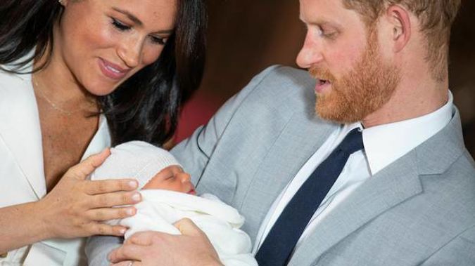 Meghan, Duchess of Sussex, was touching baby Archie's head and looking happy and emotional with Prince Harry as they presented their new baby to the world. Photo / AP.