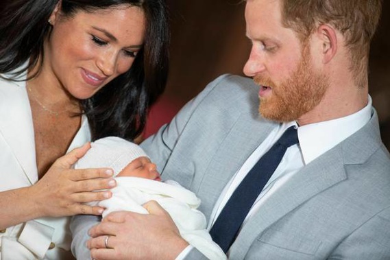 Meghan, Duchess of Sussex, was touching baby Archie's head and looking happy and emotional with Prince Harry as they presented their new baby to the world. Photo / AP.