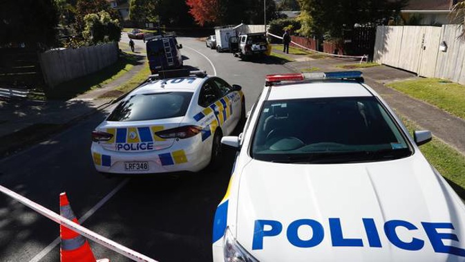 Police at the scene at a house on Weatherly Rd in Torbay. Photo / New Zealand Herald Photograph by Dean Purcell