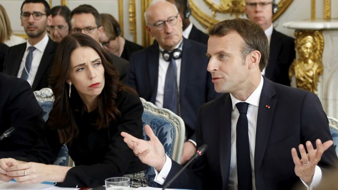 The deal, spearheaded by Jacinda Ardern and Emmanuel Macron, was signed this morning. (Photo / AP)