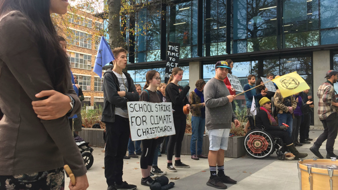 Protesters gathered outside the meeting earlier today. (Photo / ZB)