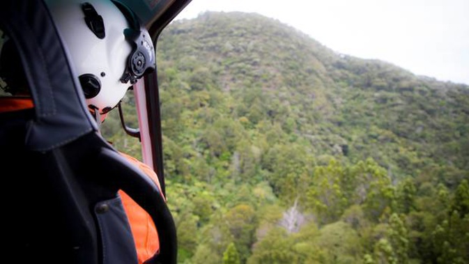 A helicopter is being used in the search for the missing man. Photo / File