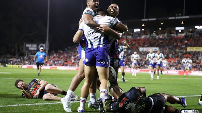 The Warriors celebrate after scoring a try during the round 10 NRL match against the Penrith Panthers. Photo / Getty Images