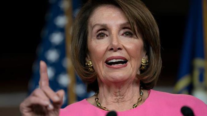 Nancy Pelosi said she is praying for the President. Photo / AP