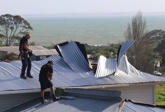 Homes have had their roofs ripped off by the tornadoes. (Photo / NZ Herald)