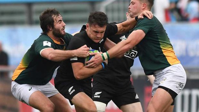 Billy Proctor of New Zealand U20 is tackled by during the game against South Africa U20. Photo /Getty