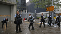 Riot police fire tear gas to protesters outside the Legislative Council in Hong Kong. Photo / AP