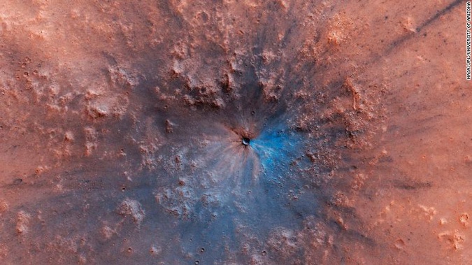 The impact crater likely formed between September 2016 and February 2019. (Photo / NASA)