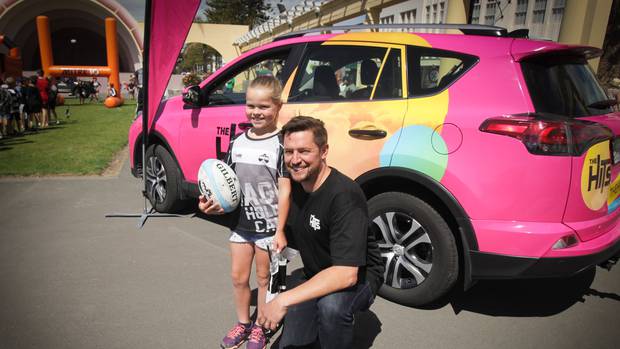 Briar Hales, pictured here in 2017 with Adam Green from The Hits, has been told her rugby team won't get any points if she plays in an upcoming tournament. Photo File