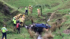 Kerry Jordan's battered car came to a stop after rolling 45 metres down a steep slope. (Photo / Philips Search and Rescue Trust)