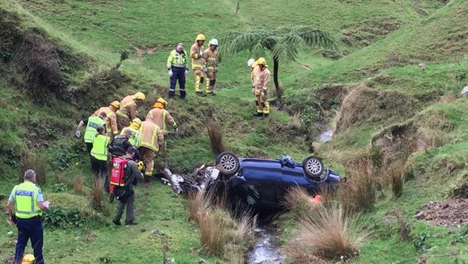 Kerry Jordan's battered car came to a stop after rolling 45 metres down a steep slope. (Photo / Philips Search and Rescue Trust)