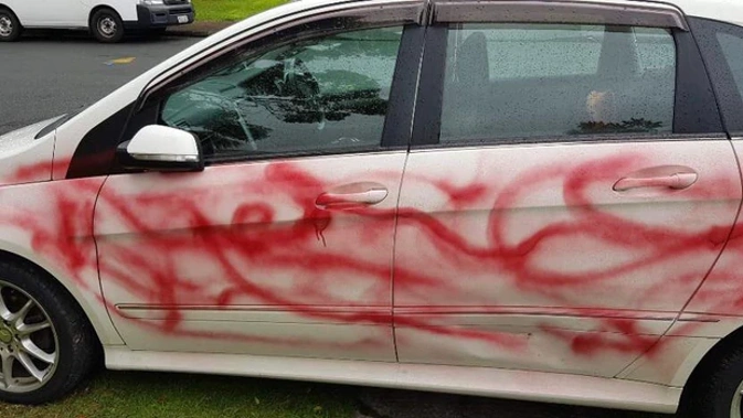 A West Auckland family have been repeatedly harassed - and in one incident their car was graffitied. Photo / Supplied