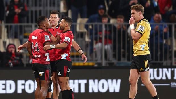 Sevu Reece of the Crusaders celebrates with Richie Mo'unga and David Havili. (Photo / Getty)