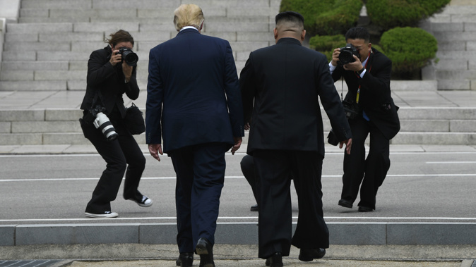 Donald Trump crossed over into North Korean territory yesterday. (Photo / AP)