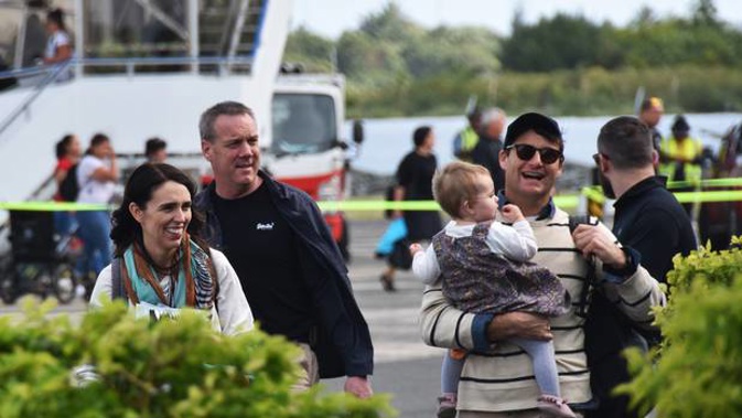 Jacinda Ardern, Clarke Gayford and baby Neve at the airport in Rarotonga. Photo / Cook Islands News