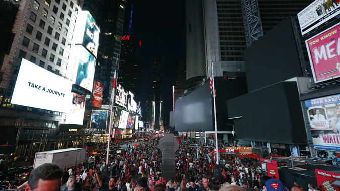 The iconic Times Square went dark due to the power outage. (Photo / AP)