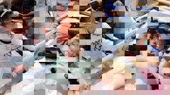 Two-year-old Amirah Najim-Phillips in Starship ICU, holding hands with her elder sister Zahara. Photo / Supplied