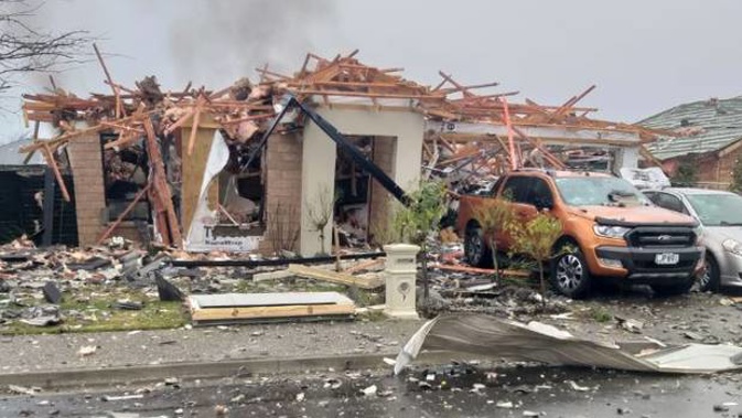 The remains of a Christchurch house which was the scene of a gas explosion this morning. Photo / James Looyer