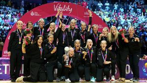 New Zealand's Laura Langman lifts the trophy with her team mates after winning the Netball World Cup. Photo / Getty
