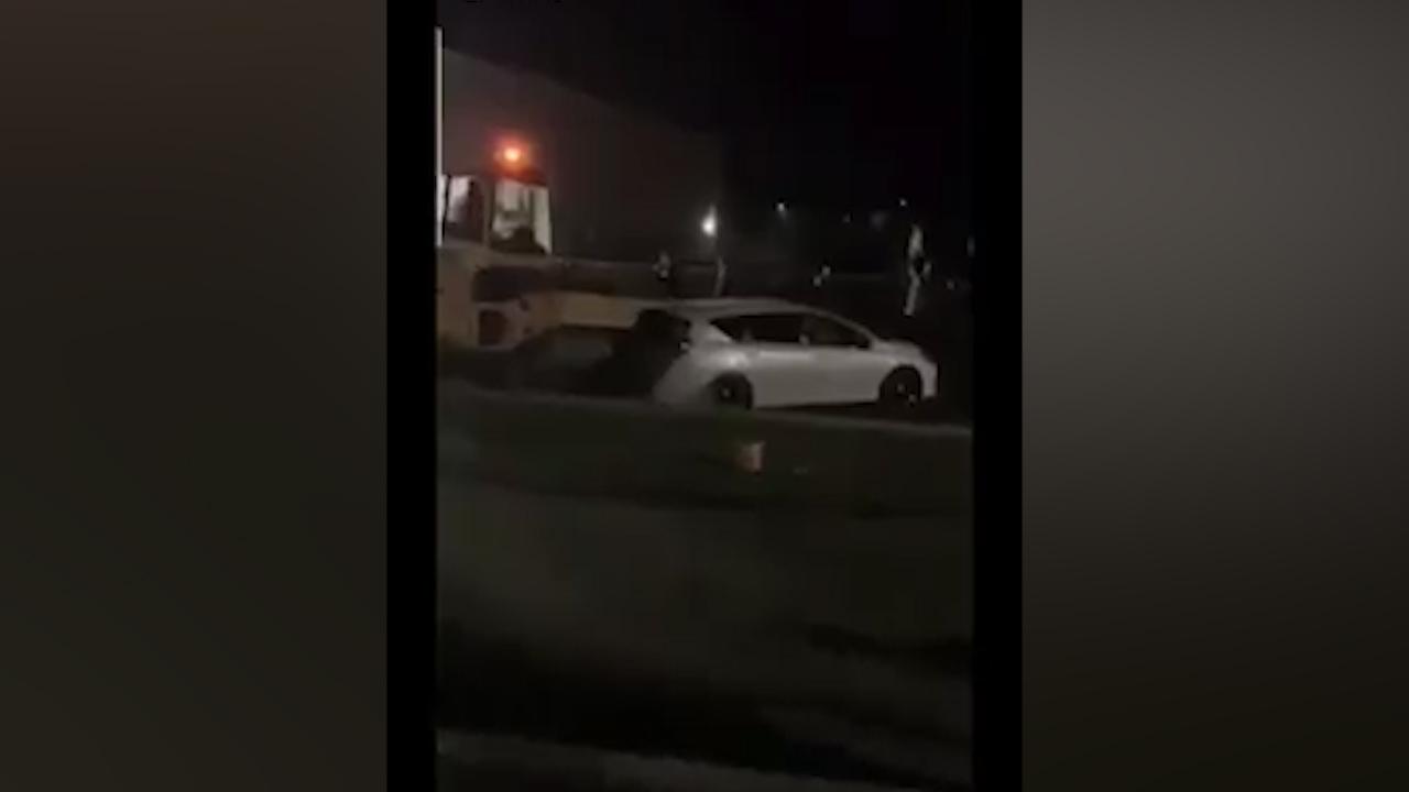 Road roller seen running over cars in Wellington. (Video: Supplied)