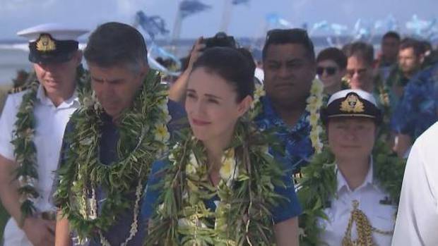 Jacinda Ardern, accompanied for her father Ross, left, is the the first NZ prime minister to visit Tokelau in 15 years.