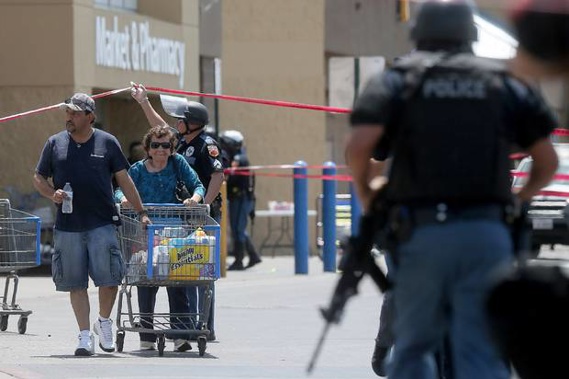 Walmart customers are escorted from the store after a gunman opened fire on shoppers near the Cielo Vista Mall in El Paso, Texas. Photo / AP