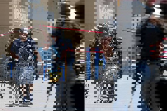 Walmart customers are escorted from the store after a gunman opened fire on shoppers near the Cielo Vista Mall in El Paso, Texas. Photo / AP