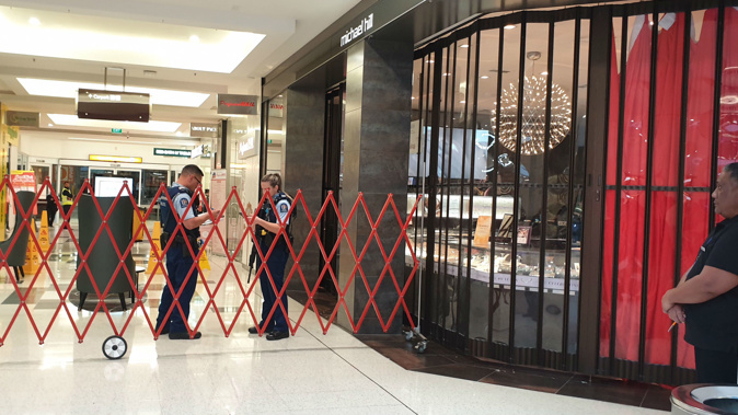 Cops at St Lukes Mall where reports of gun shot at Michael Hi jeweller. (Photo / Jacqui Robertson)