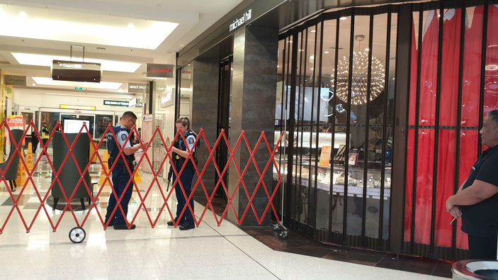 Cops at St Lukes Mall where reports of gun shot at Michael Hi jeweller. (Photo / Jacqui Robertson)