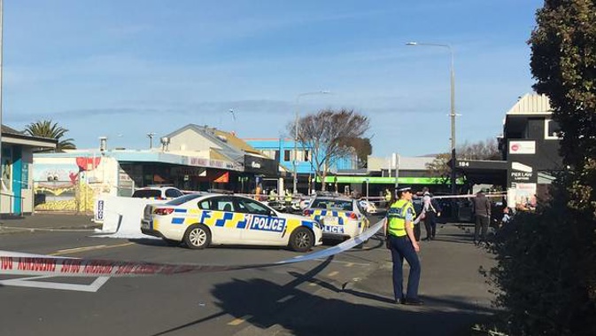 Police block a road in New Brighton, Christchurch, after a pedestrian was killed following being struck by a car that was involved in a police chase. (Photo / Lavinia Bishop)