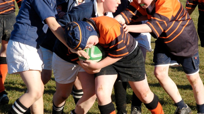 Former All Blacks team doctor John Mayhew says that banning kids from contact sports won't stop them from getting concussed. (Photo / File)