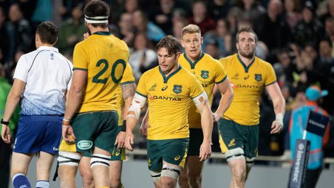 Wallabies captain Michael Hooper, center, leaves the field after losing to the All Blacks during a Bledisloe Cup rugby test between the All Blacks and Australia at Eden Park. Photo / AP