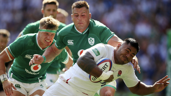 England's Manu Tuilagi scores his side's third try of the game during the international match against Ireland. (Photo / AP)