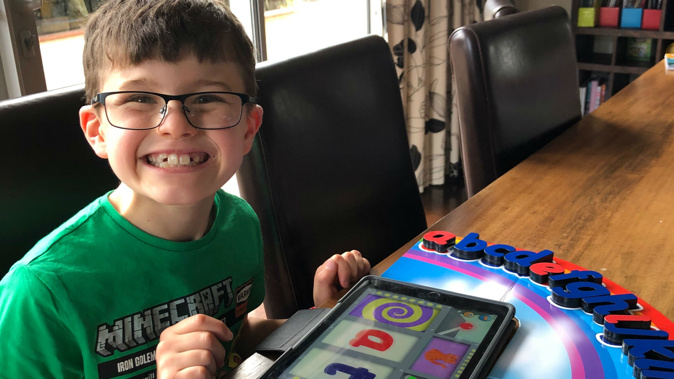 Dyslexic Christchurch schoolboy Ben Scurr lost "the sparkle in his eyes" when he struggled to read at school; now his mum has organised a phonics tutor for him. (Photo / Supplied)
