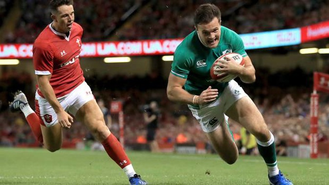 Ireland's Jacod Stockdale scores the opening try against Wales. (Adam Davy/PA via AP)