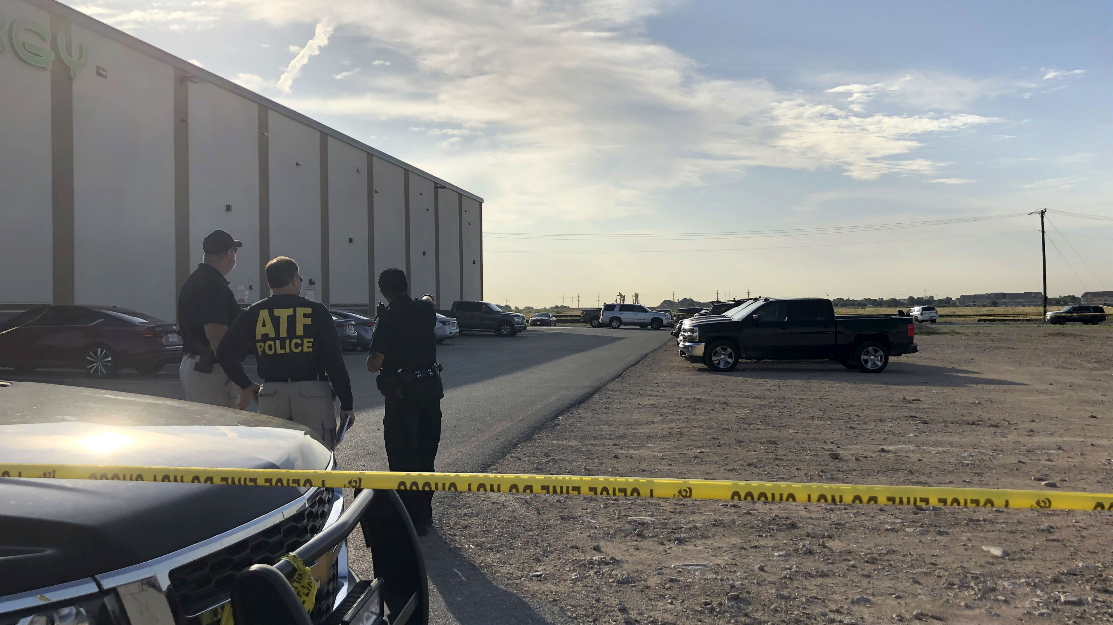 The theatre carpark where authorities say the shooter was killed. (Photo / AP)