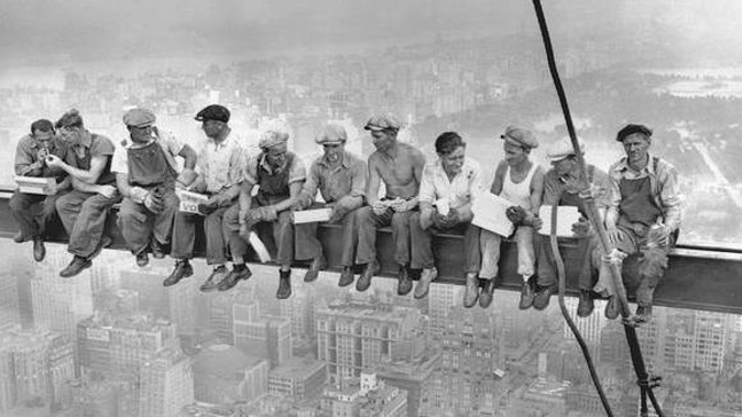 Intrepid steel workers eat lunch atop the 70 story RCA building in Rockefeller Centre in New York in 1932. (Photo / Getty )