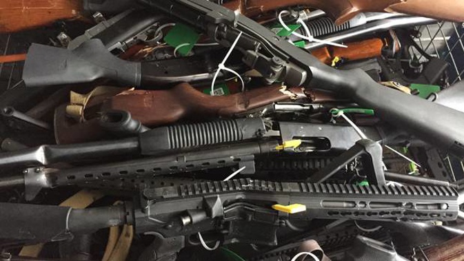 Some of the guns collected at one of the buyback events. (Photo / ZB)