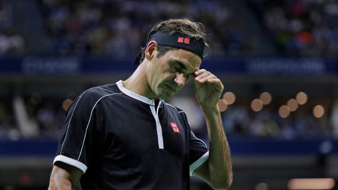 Roger Federer reacts during the match. (Photo / AP)