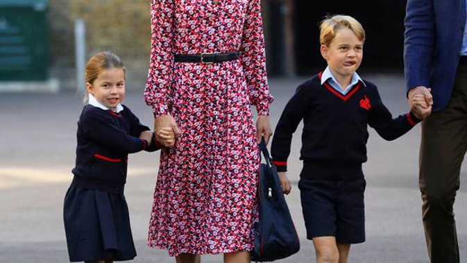 Princess Charlotte arrives for her first day of school at Thomas's Battersea in London, with her brother Prince George. (Photo / AP)