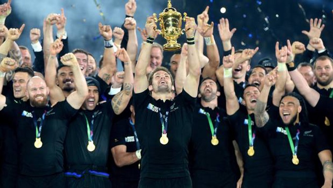 Richie McCaw of New Zealand lifts the Webb Ellis Trophy after winning the 2015 Rugby World Cup. Photo / Photosport