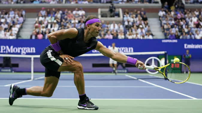 Rafael Nadal returns a shot to Daniil Medvedev during the men's singles final of the U.S. Open. (Photo / AP)