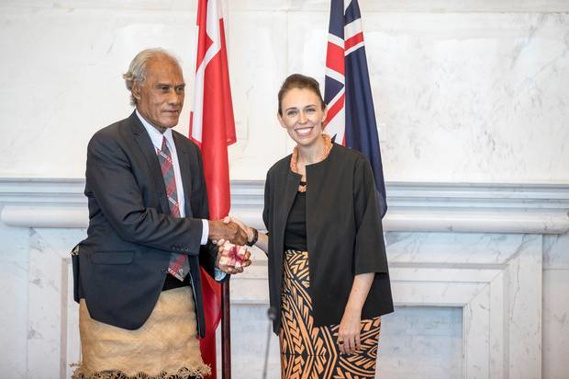 Prime Minister Hon. 'Akilisi Pohiva and The Right Honourable Jacinda Ardern Prime Minister of New Zealand exchange gifts before the start of bilateral talks last year. Photo / AP